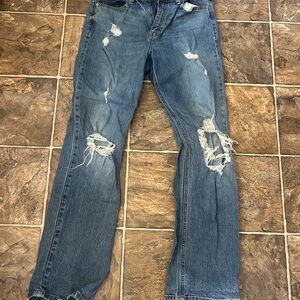 Women’s Distressed Blue Denim Jeans - Classic Ripped Style